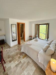 Postel nebo postele na pokoji v ubytování O' Stiavucco B&B