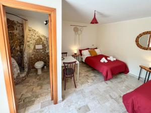 Postel nebo postele na pokoji v ubytování O' Stiavucco B&B