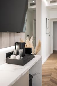 a coffee maker on a counter in a kitchen at De Pusterla Luxury Rooms in Zadar