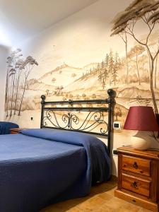 Postel nebo postele na pokoji v ubytování Agriturismo B&B La Sterpina