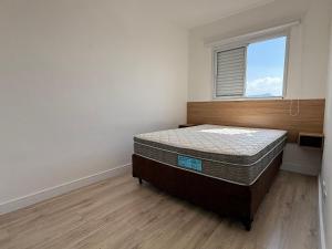 Postel nebo postele na pokoji v ubytování Apê Tupi c/ Wi-Fi e vaga a 600m da praia!