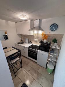 Kuchyň nebo kuchyňský kout v ubytování Apartman Josip