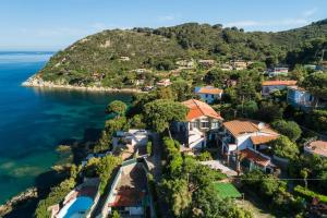 an aerial view of a village on a hill next to the ocean at Casa Sabrina in Portoferraio