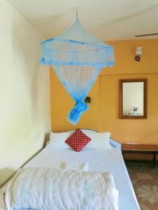Voodi või voodid majutusasutuse Hotel Rhino Land-Sauraha Family Home toas