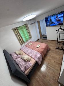 Postel nebo postele na pokoji v ubytování Apartman Josip