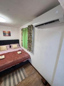 Postel nebo postele na pokoji v ubytování Apartman Josip