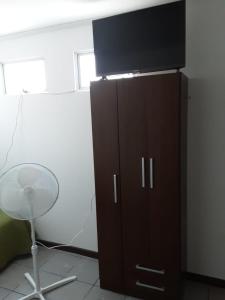TV a/nebo společenská místnost v ubytování Anexo Hotel Quitor