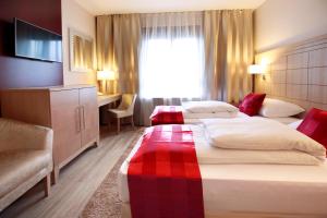 Posteľ alebo postele v izbe v ubytovaní Hotel Raca