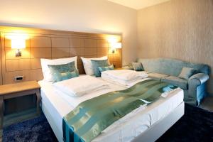Posteľ alebo postele v izbe v ubytovaní Hotel Raca