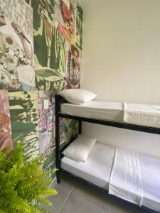 Postel nebo postele na pokoji v ubytování Odara Hostel