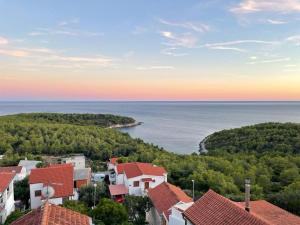 a view of the ocean from a building at Sunrise Sunset Seaview Walk to Vis Iconic Beaches in Rukavac