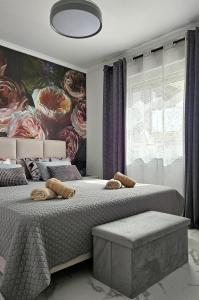 En eller flere senge i et værelse på VISTA MaR