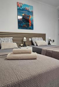 En eller flere senge i et værelse på VISTA MaR