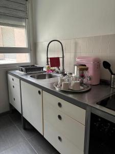 Kuchyňa alebo kuchynka v ubytovaní Appartement Bron