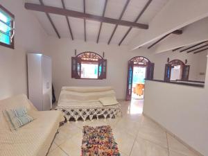 Khu vực ghế ngồi tại Suítes Arraial 300m do Centro