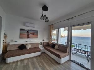 Posezení v ubytování Anastasia Beach House Haraki