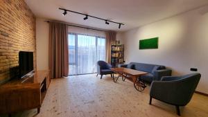 Телевізор і / або розважальний центр в Apart hotel In DIlijan , Designed by Khi