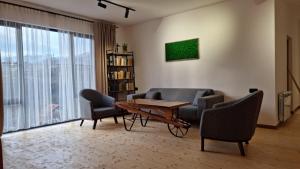 Зона вітальні в Apart hotel In DIlijan , Designed by Khi