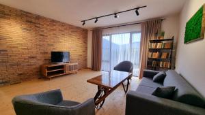 Телевізор і / або розважальний центр в Apart hotel In DIlijan , Designed by Khi