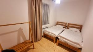 Ліжко або ліжка в номері Apart hotel In DIlijan , Designed by Khi