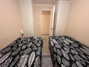 En eller flere senger på et rom på Departamento Completamente Equipado