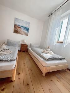 Posteľ alebo postele v izbe v ubytovaní Apartment Dalmatera