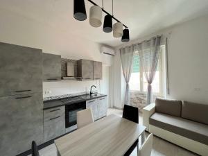 Η κουζίνα ή μικρή κουζίνα στο Olbia Terranova - Apartments
