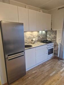 Kuchyň nebo kuchyňský kout v ubytování Oja 118-49 apartment
