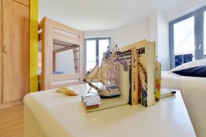 Postel nebo postele na pokoji v ubytování Ferienhaus Leuchtturm