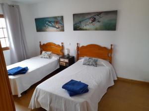 Posteľ alebo postele v izbe v ubytovaní Casa Ana Perez