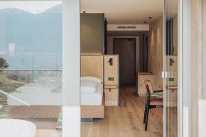 Postel nebo postele na pokoji v ubytování Hotel Lisetta