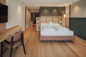 Postel nebo postele na pokoji v ubytování Hotel Lisetta