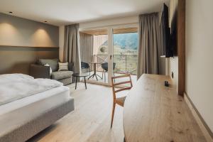 Postel nebo postele na pokoji v ubytování Hotel Lisetta