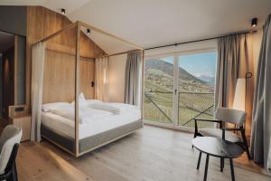 Postel nebo postele na pokoji v ubytování Hotel Lisetta