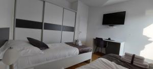 Postel nebo postele na pokoji v ubytování Sky View