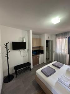Postel nebo postele na pokoji v ubytování Studio apartman Štefanija