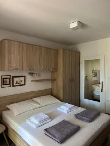 Postel nebo postele na pokoji v ubytování Studio apartman Štefanija