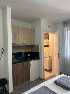 Kuchyň nebo kuchyňský kout v ubytování Studio apartman Štefanija