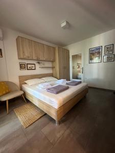 Postel nebo postele na pokoji v ubytování Studio apartman Štefanija