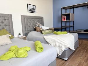 Postel nebo postele na pokoji v ubytování Hotel Vive Jarocho-APT y Domo a 5 min Playa