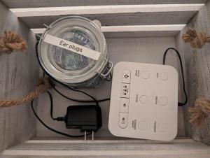 a box with a light and a remote control at BrewPub Bungalow #1 in Oakridge