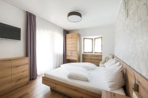 Postel nebo postele na pokoji v ubytování Ferienwohnungen Alber