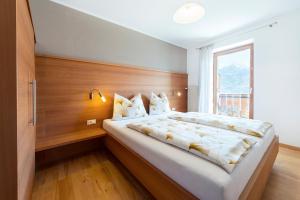 Postel nebo postele na pokoji v ubytování Eggbauer Panorama Apartments
