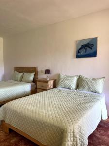 Ένα ή περισσότερα κρεβάτια σε δωμάτιο στο Habitacion 2 en Dani's Guest House
