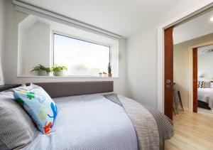 a bedroom with a bed with a pillow on it at For Students Only Tower in Bristol in Bristol