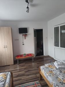 Postel nebo postele na pokoji v ubytování Cabana Colț de Rai