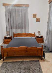 Postel nebo postele na pokoji v ubytování Λευκή Καμέλια
