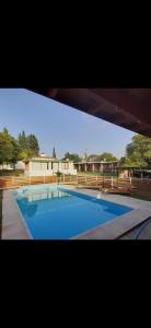 Bazén v ubytování Complejo Olmos 1835 nebo v jeho okolí