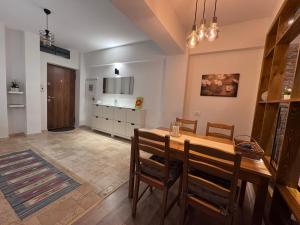 Kuchyň nebo kuchyňský kout v ubytování Central-home + 6 fotografií