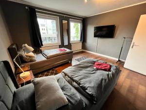 TV a/nebo společenská místnost v ubytování Am Park + 6 fotografií